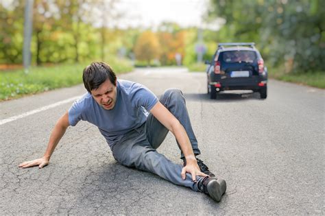 person run over by car